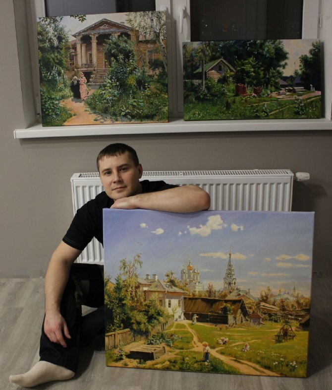 Художник с картинами